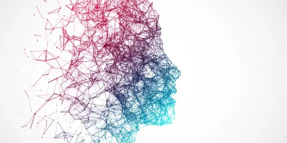 Abstract silhouette of a human face formed by interconnected lines and nodes in gradient colors from red to blue.