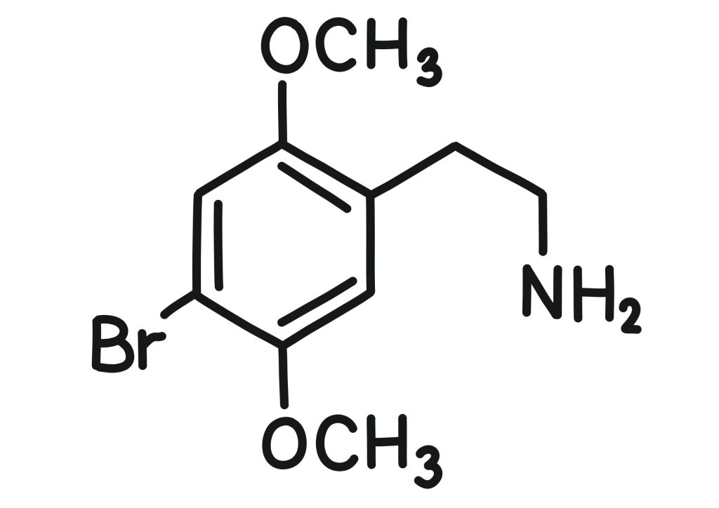 Chemical structure of a brominated aromatic compound with methoxy and amino groups.