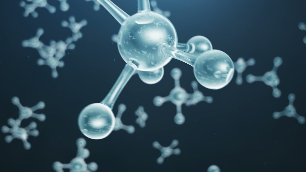 Close-up of translucent molecules floating in a dark background, showcasing intricate structures and connections.