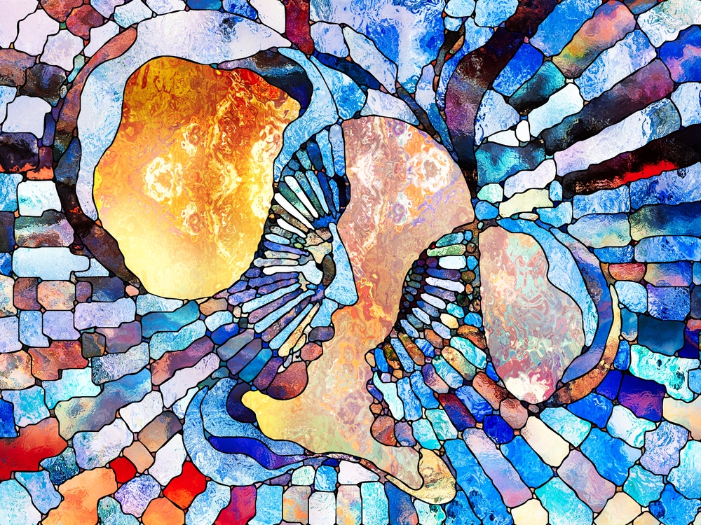 Colorful abstract stained glass design featuring intertwined human profiles and vibrant swirling patterns.