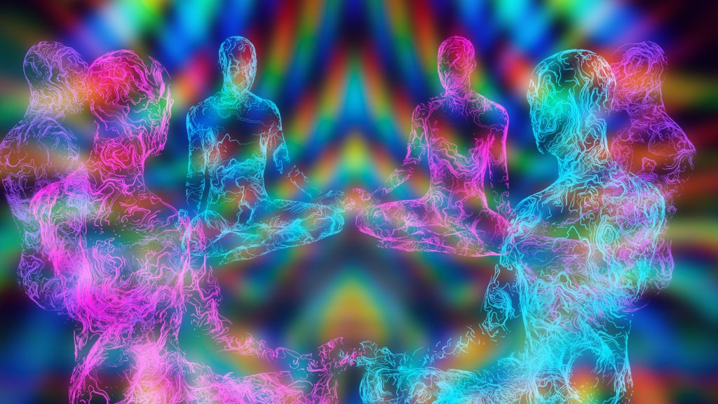 Colorful, glowing figures in a meditative pose, surrounded by vibrant, swirling patterns of light.