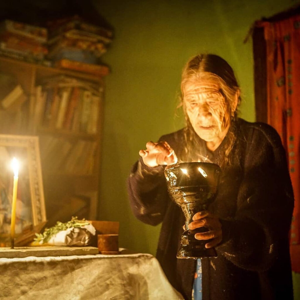 elderly-woman-dimly-lit-room.jpg