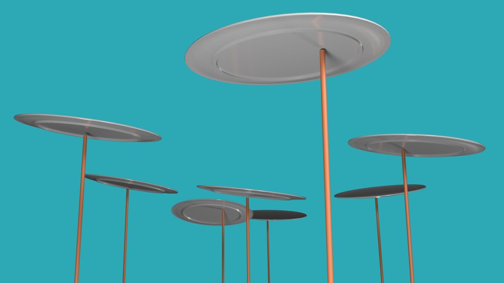 Floating metallic plates on slender poles against a bright turquoise background.