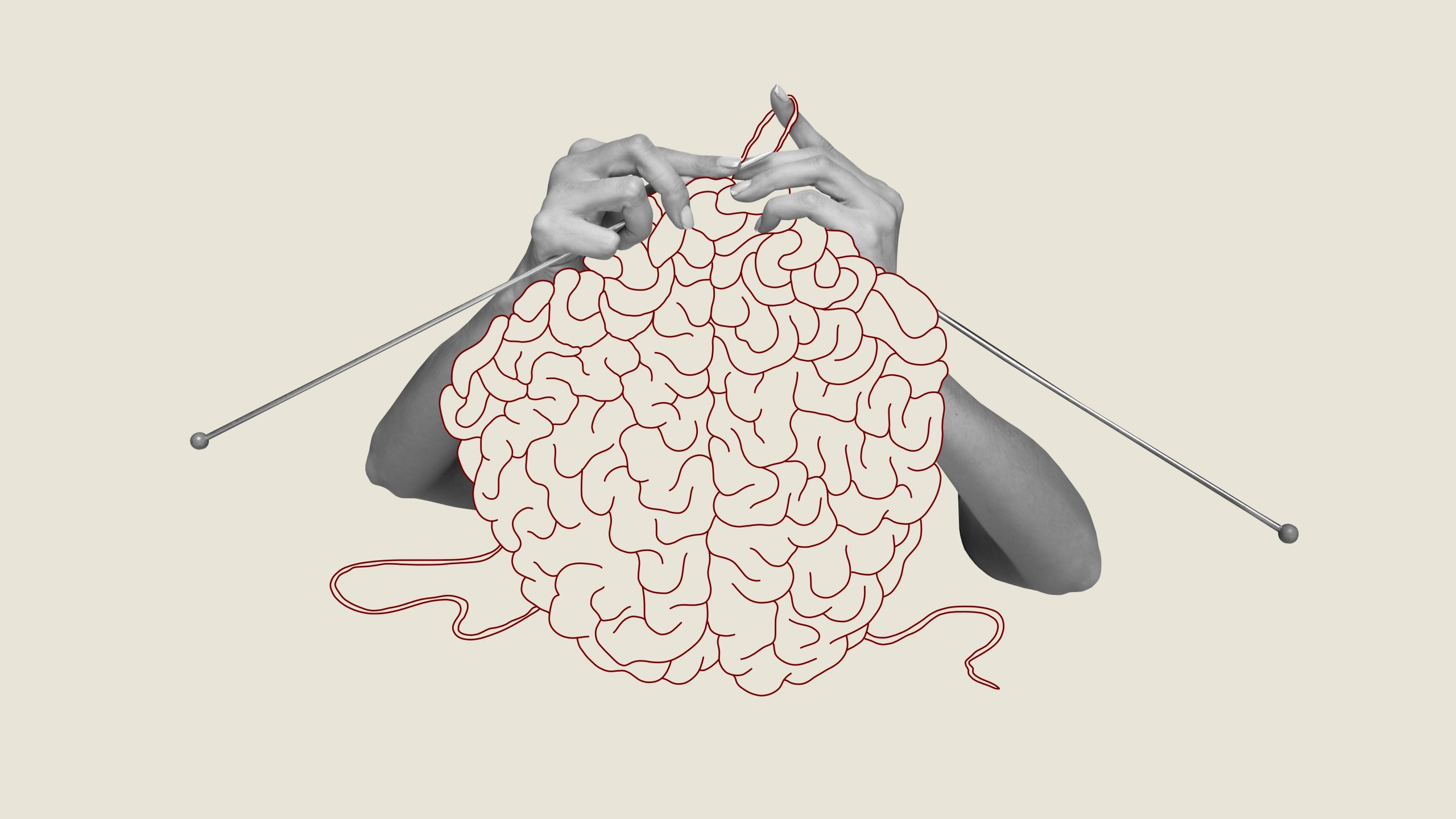 Hands knitting with needles, forming a brain shape, blending creativity and intellect against a neutral background.