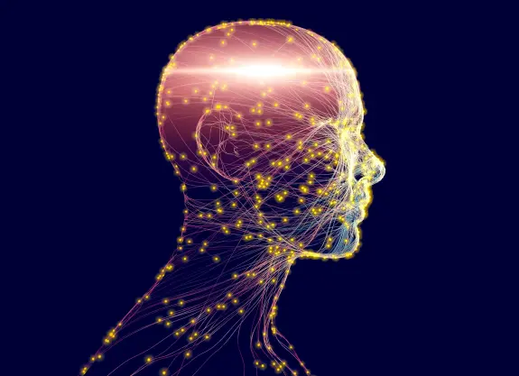 Profile of a human head with glowing neural connections and bright nodes against a dark background.