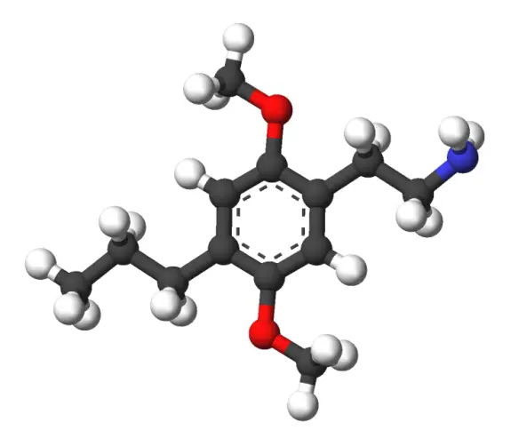 3D molecular structure with black, white, red, and blue spheres representing atoms, connected by gray bonds.