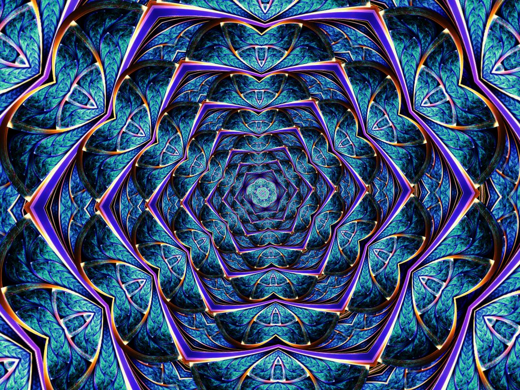 Intricate spiral pattern in vibrant blue and purple hues, resembling a kaleidoscopic flower.