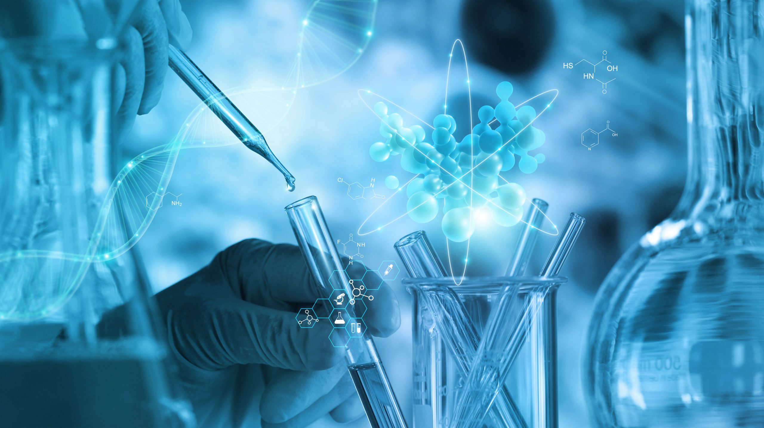 Laboratory scene featuring test tubes, a pipette, and a glowing atomic structure against a blue background.