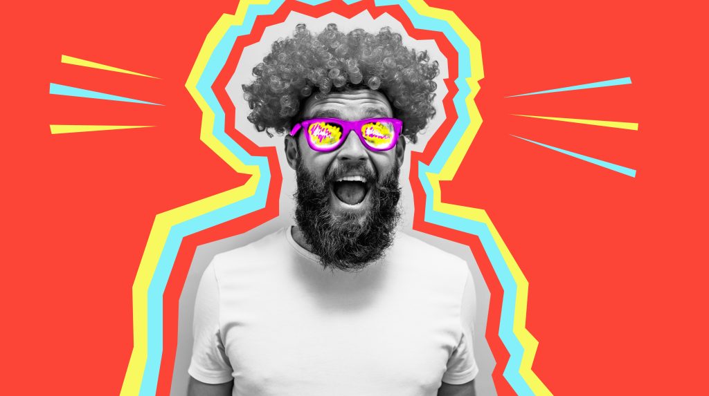 Man with a curly wig and colorful sunglasses smiles against a vibrant red background with bold graphic lines.