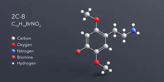 3D molecular structure of 2C-B, highlighting carbon, oxygen, nitrogen, bromine, and hydrogen atoms in various colors.