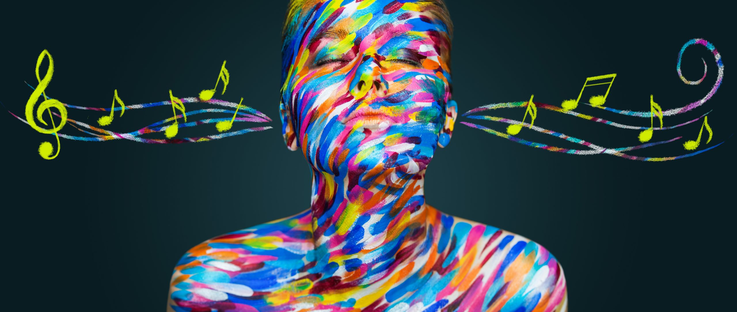 A person with vibrant, multicolored body paint, eyes closed, surrounded by swirling musical notes.