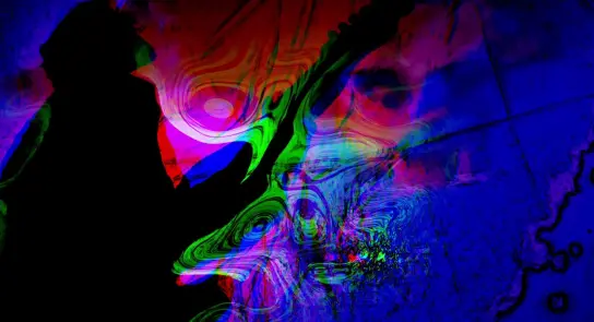 Silhouette of a guitarist against a vibrant, abstract background of swirling colors and patterns.