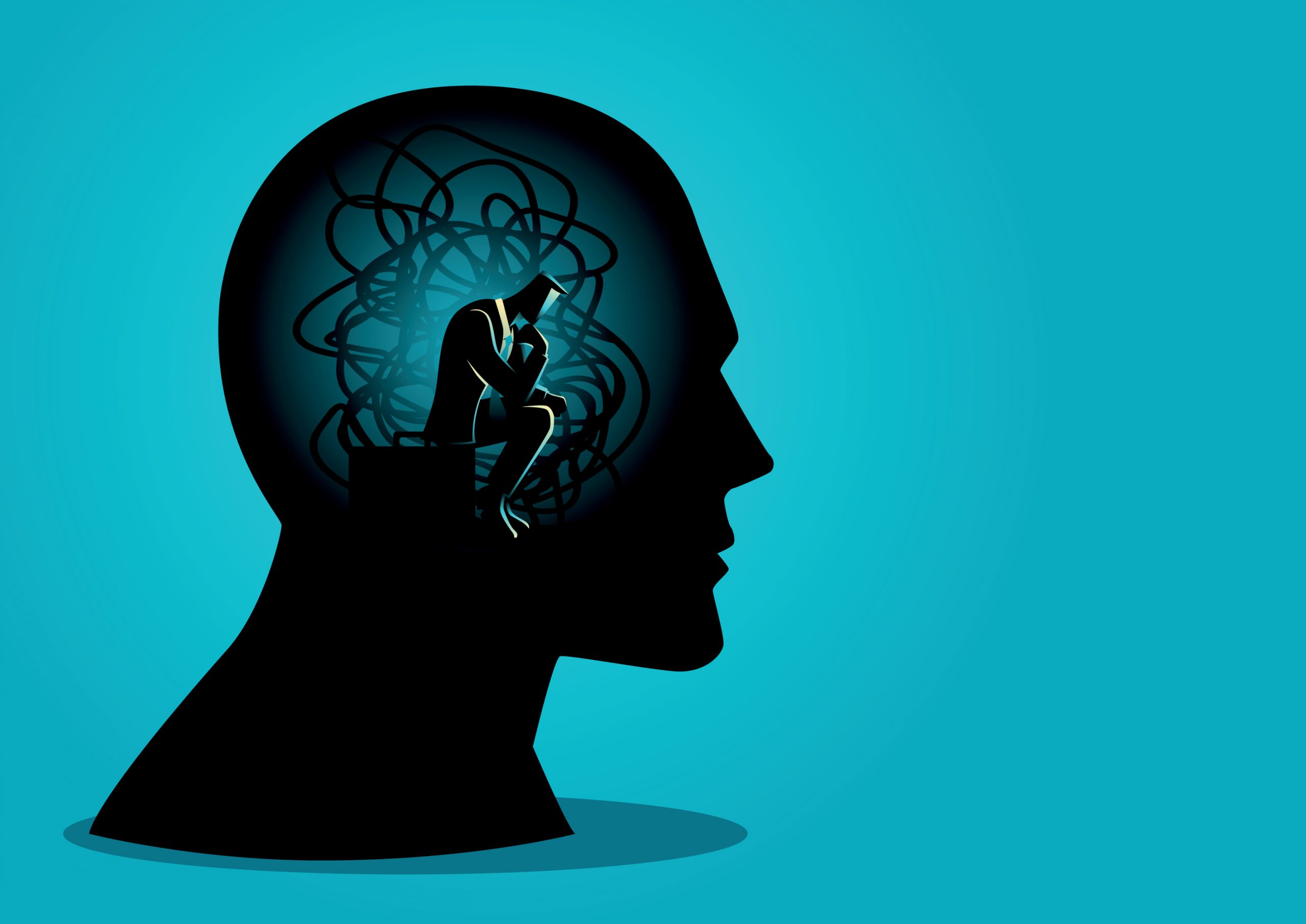 Silhouette of a head with a tangled mind, featuring a figure in a suit sitting in contemplation.