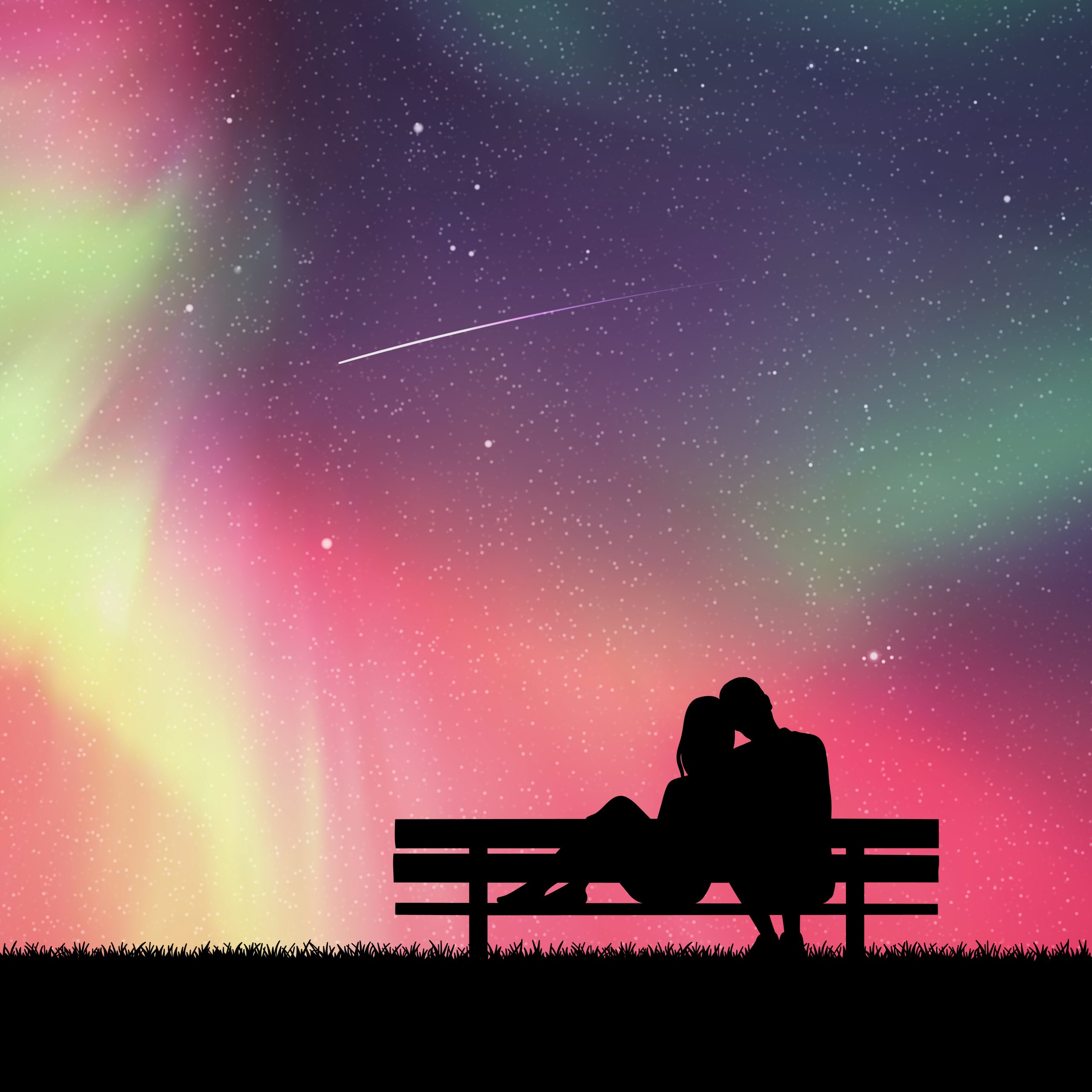 Silhouetted couple kissing on a bench under a vibrant aurora and starry sky.