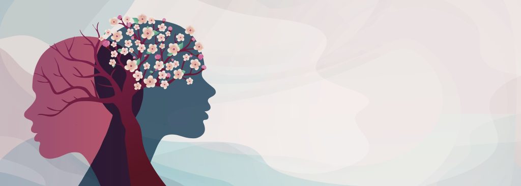 Silhouettes of two heads in profile, one with tree branches and the other adorned with blooming flowers, against a soft ba...