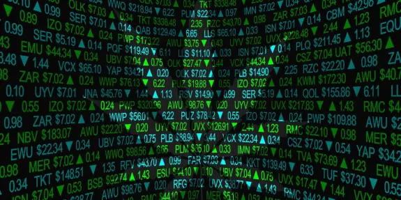 Stock market data displayed on a digital screen with green and black numbers, symbols, and upward trends.