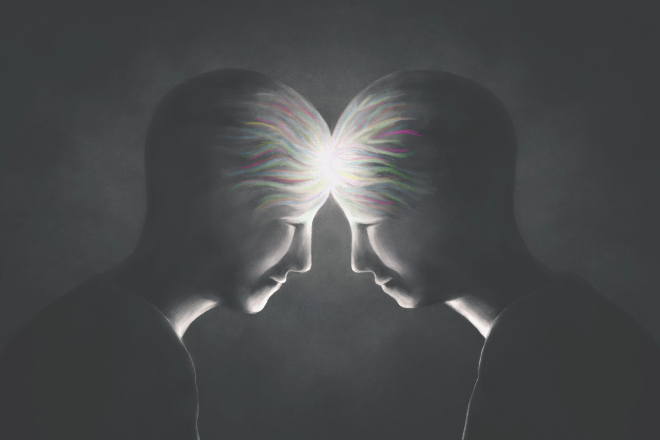 Two abstract figures with smooth heads lean towards each other, sharing a glowing light at their foreheads in a dark backg...