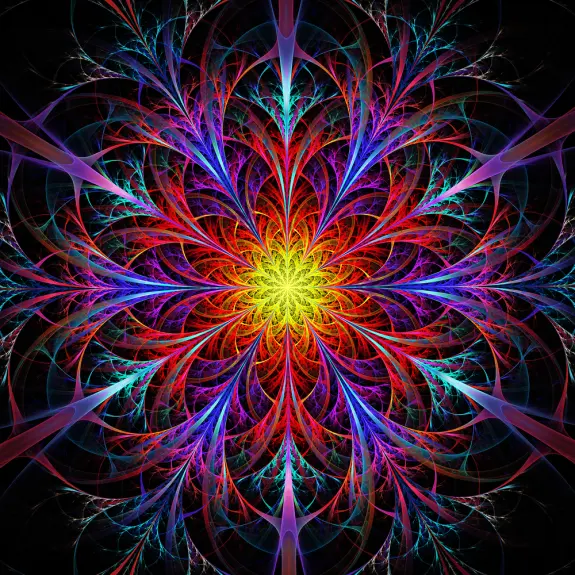 Vibrant fractal pattern radiating from a central yellow core, surrounded by intricate swirls of red, blue, and purple.