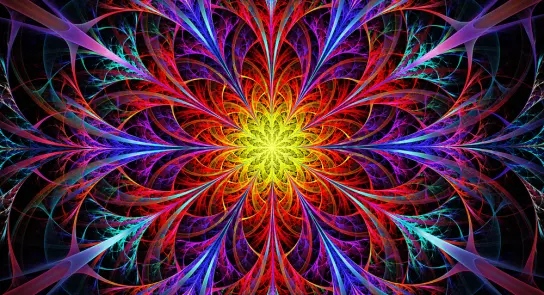 Vibrant fractal pattern radiating from a central yellow core, surrounded by intricate swirls of red, blue, and purple.
