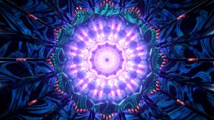 Vibrant kaleidoscopic pattern with swirling blues and purples, radiating a central glowing light.
