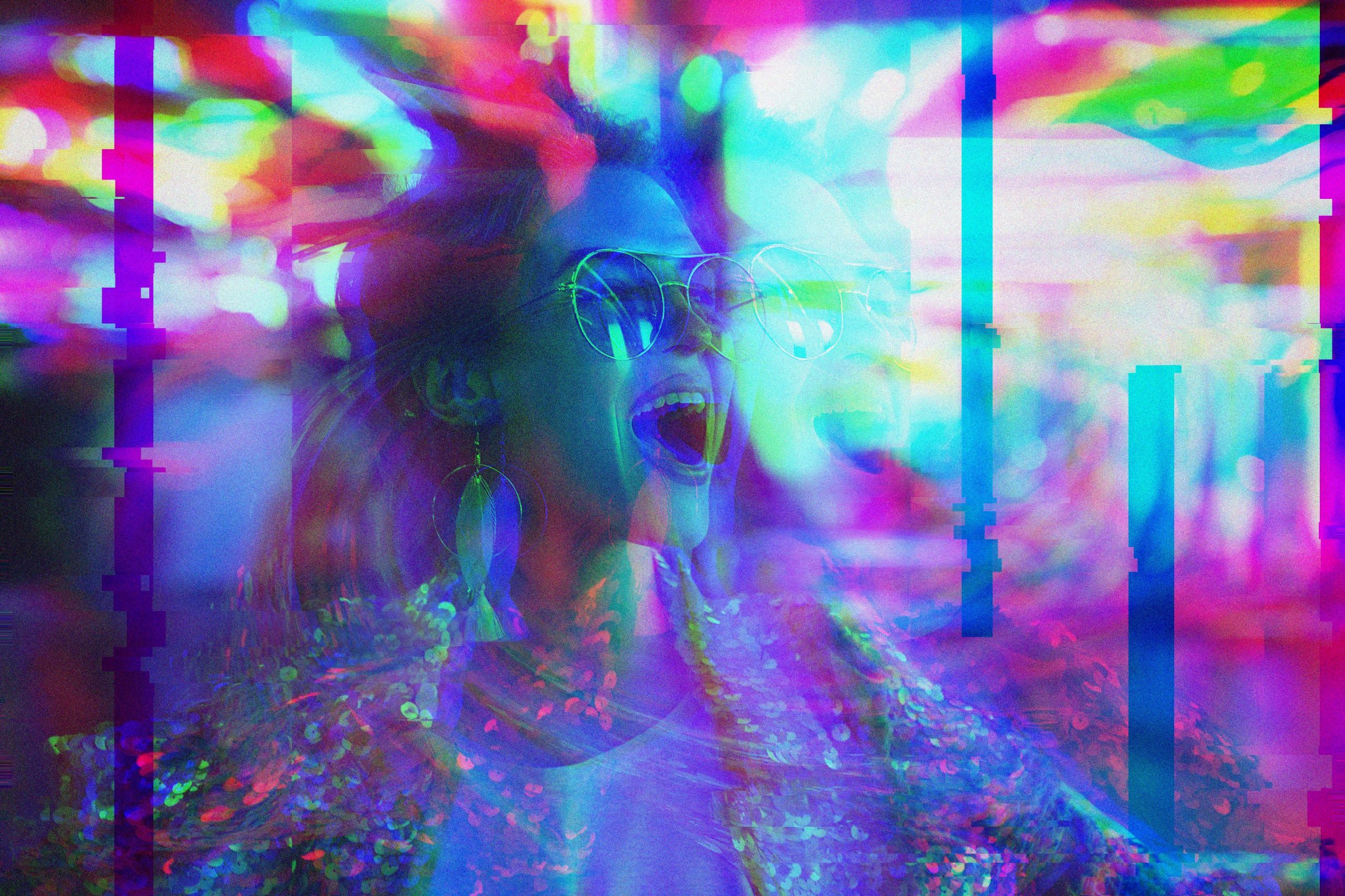 Woman with sunglasses and earrings, joyfully laughing amidst vibrant, glitchy neon lights.